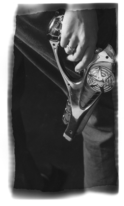 Liz with gun at her side