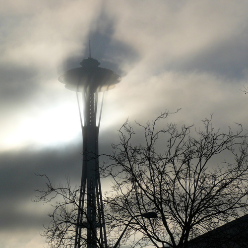 Space needle in morning clouds